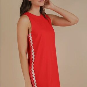 Red Sleeveless Dress with White Trim